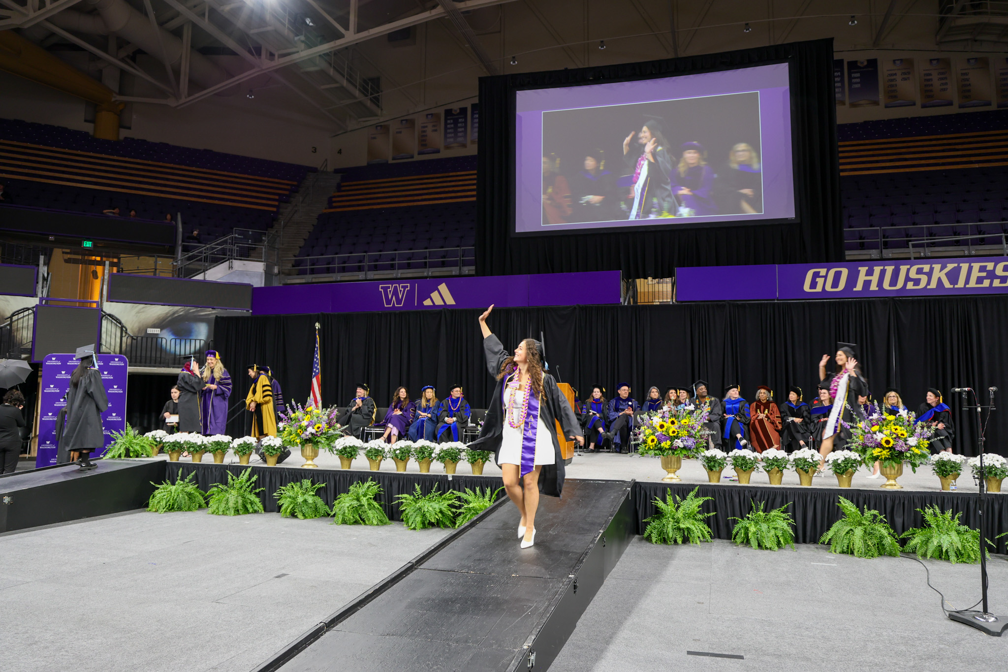 student walking down stage