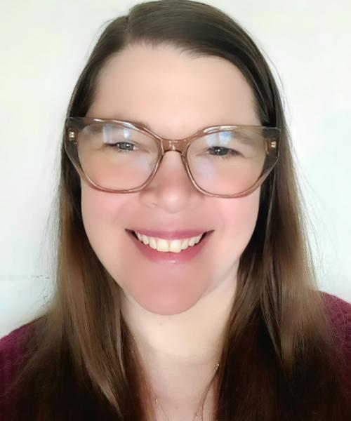 Headshot of Sarah Bishop, Academic Adviser, smiling in front of a white background